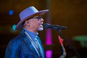 A Man is singing a song in an event