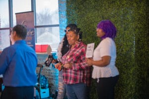 3 women hosting an event