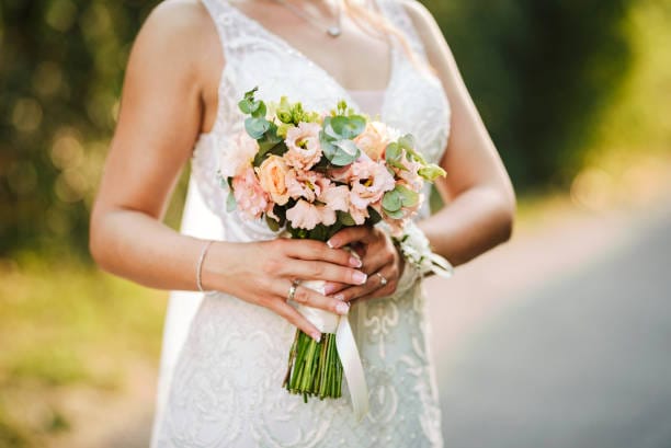 Bride holding a beautiful wedding bouquet