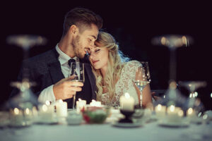 A Couple having a candle light dinner